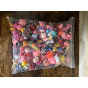 Large Bag of Peppa Pig Figures.